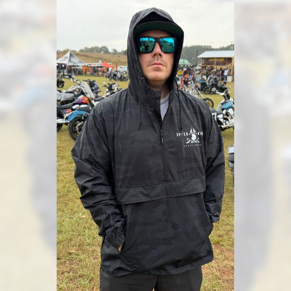 Ride Fast Split Lanes Black Camo Waterproof Hooded Windbreaker for Motorcycle Riders by Speed Kings Cycle Front Side on Person