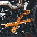 Anodized orange billet aluminum motorcycle foot pegs