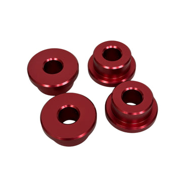 Red anodized solid-mount billet riser bushing kit (set of 4), CNC-machined aluminum for Harley Dyna, FXR, Sportster