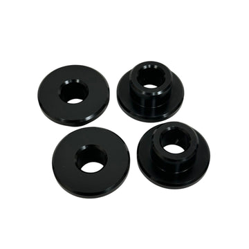 Black anodized CNC‑machined billet aluminum riser bushing kit, 4‑piece solid mount for M8 Softail & Touring models, reduces handlebar slop