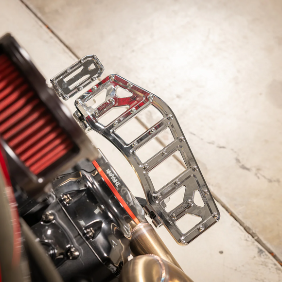 Thrashin Supply Co. Aggressor brake pedal for Harley-Davidson Touring with stainless steel cleats – chrome, black, and contrast cut options