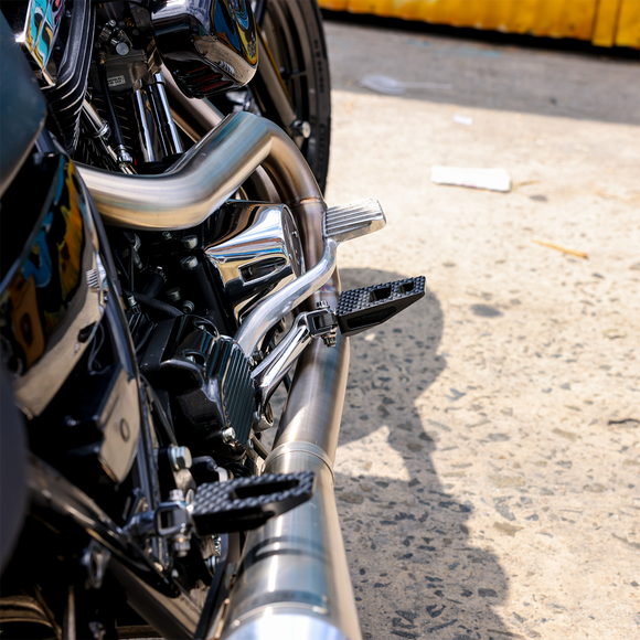 Thrashin Supply Co. P-54 Slim Footpegs aircraft-grade 6061 aluminum chrome finish for 2018-2025 Harley-Davidson Softail