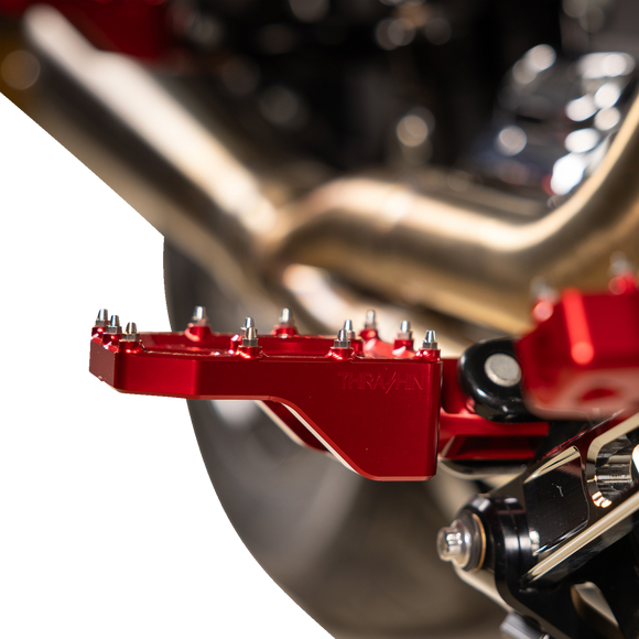 Thrashin Supply Co. Aggressor billet aluminum foot pegs with stainless steel cleats for Harley-Davidson Touring, Softail, Dyna, and Sportster