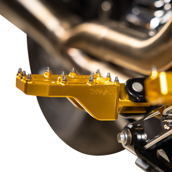 Thrashin Supply Co. Aggressor billet aluminum foot pegs with stainless steel cleats for Harley-Davidson Touring, Softail, Dyna, and Sportster