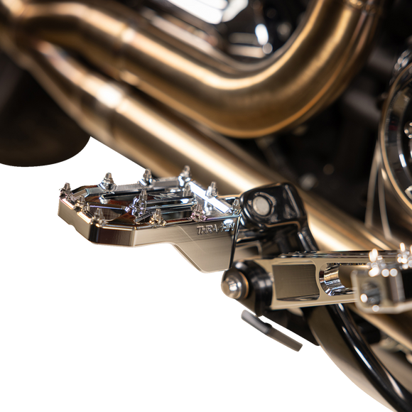 Thrashin Supply Co. Aggressor billet aluminum foot pegs with stainless steel cleats for Harley-Davidson Touring, Softail, Dyna, and Sportster