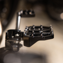 Thrashin Supply Co. Mini Aggressor Floorboards with stainless steel cone cleats on billet 6061 aluminum for Harley-Davidson Softail Dyna Touring and Sportster models