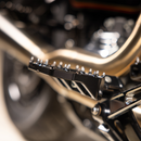Thrashin Supply Co. Mini Aggressor Floorboards with stainless steel cone cleats on billet 6061 aluminum for Harley-Davidson Softail Dyna Touring and Sportster models