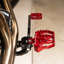 Thrashin Supply Co. Mini Aggressor Floorboards with stainless steel cone cleats on billet 6061 aluminum for Harley-Davidson Softail Dyna Touring and Sportster models