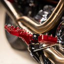 Thrashin Supply Co. Mini Aggressor Floorboards with stainless steel cone cleats on billet 6061 aluminum for Harley-Davidson Softail Dyna Touring and Sportster models