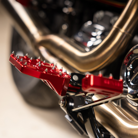 Thrashin Supply Co. Mini Aggressor Floorboards with stainless steel cone cleats on billet 6061 aluminum for Harley-Davidson Softail Dyna Touring and Sportster models