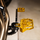 Thrashin Supply Co. Mini Aggressor Floorboards with stainless steel cone cleats on billet 6061 aluminum for Harley-Davidson Softail Dyna Touring and Sportster models