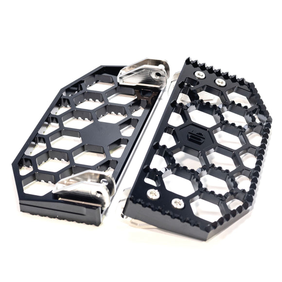 Black billet aluminum honeycomb motorcycle footpegs with serrated grip