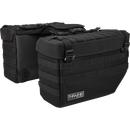 Thrashin Supply Co. Expedition Saddlebags in black ballistic nylon with MOLLE attachments and metal g-hook lids for Harley-Davidson Softail, Dyna, and FXR models