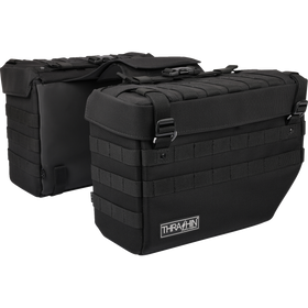 Thrashin Supply Co. Expedition Saddlebags in black ballistic nylon with MOLLE attachments and metal g-hook lids for Harley-Davidson Softail, Dyna, and FXR models