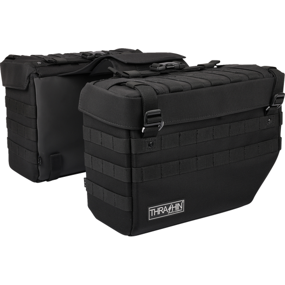 Thrashin Supply Co. Expedition Saddlebags in black ballistic nylon with MOLLE attachments and metal g-hook lids for Harley-Davidson Softail, Dyna, and FXR models