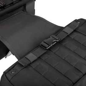 Thrashin Supply Co. Expedition Saddlebags in black ballistic nylon with MOLLE attachments and metal g-hook lids for Harley-Davidson Softail, Dyna, and FXR models