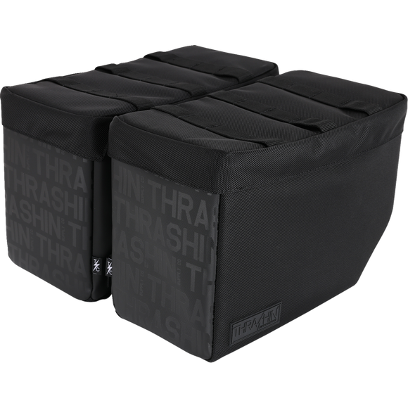 Thrashin Supply Co. Escape Base Saddlebags 18-liter in black ballistic nylon with MOLLE lid points and hi-viz orange interior