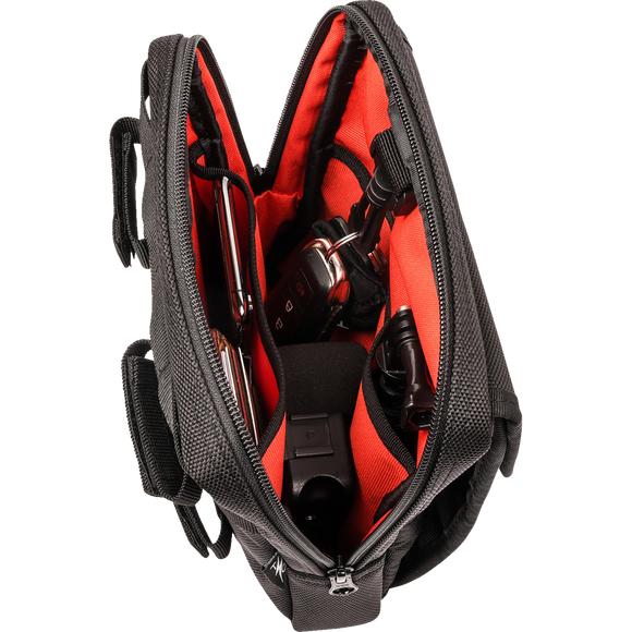 Thrashin Supply Co. Slim Handlebar Bag in black ballistic nylon mounted between fairing and gas tank on Harley-Davidson