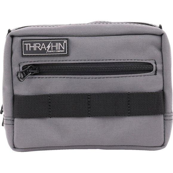 Thrashin Supply Co. ballistic nylon handlebar bag with YKK zippers and quick-attach straps mounted on Harley-Davidson handlebars