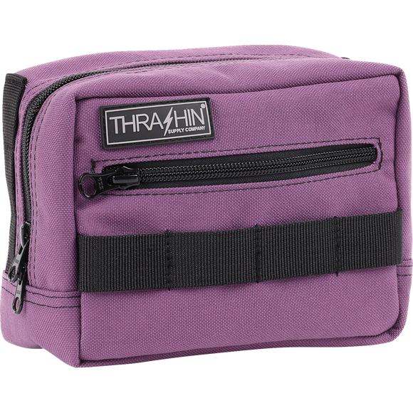 Thrashin Supply Co. ballistic nylon handlebar bag with YKK zippers and quick-attach straps mounted on Harley-Davidson handlebars