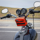Thrashin Supply Co. ballistic nylon handlebar bag with YKK zippers and quick-attach straps mounted on Harley-Davidson handlebars