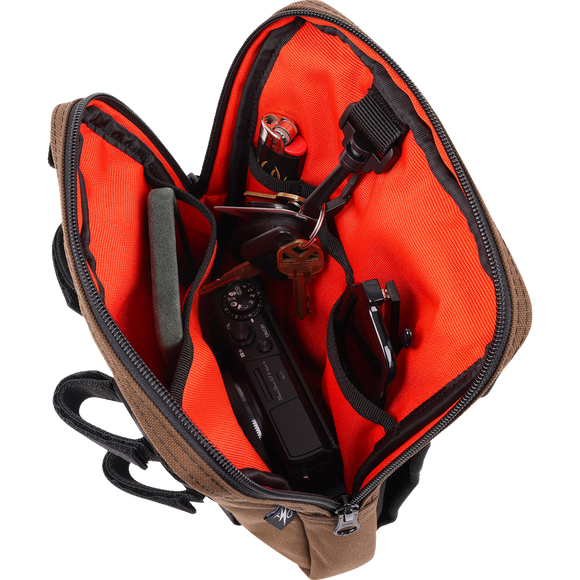 Thrashin Supply Co. Slim Handlebar Bag in black ballistic nylon mounted between fairing and gas tank on Harley-Davidson