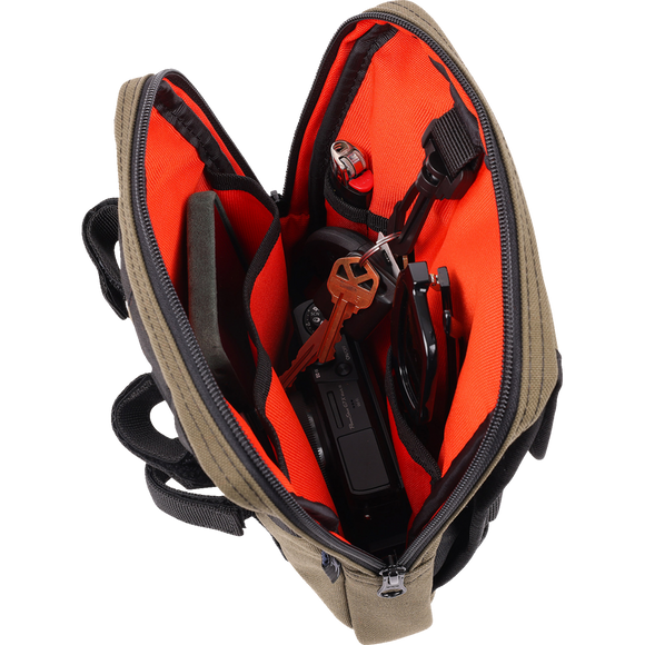 Thrashin Supply Co. Slim Handlebar Bag in black ballistic nylon mounted between fairing and gas tank on Harley-Davidson