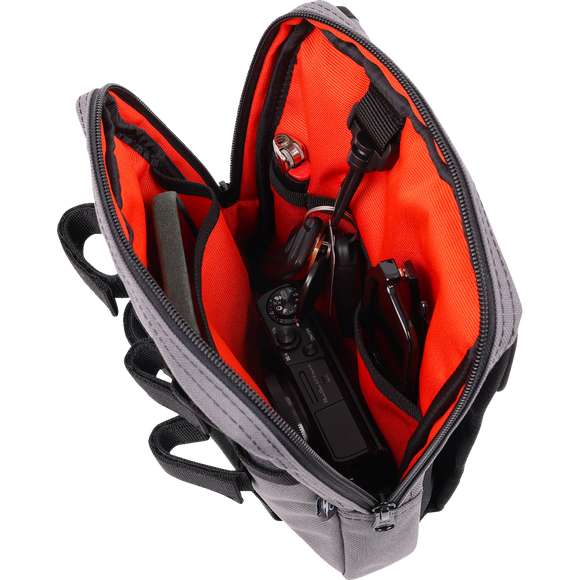 Thrashin Supply Co. Slim Handlebar Bag in black ballistic nylon mounted between fairing and gas tank on Harley-Davidson