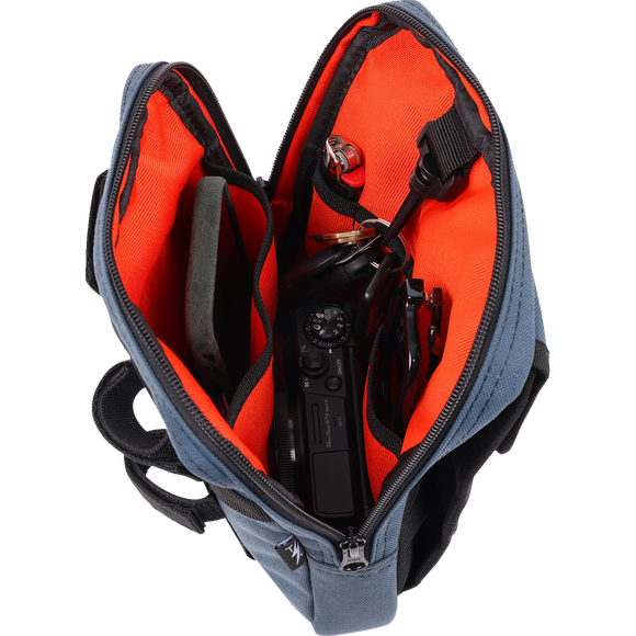 Thrashin Supply Co. Slim Handlebar Bag in black ballistic nylon mounted between fairing and gas tank on Harley-Davidson