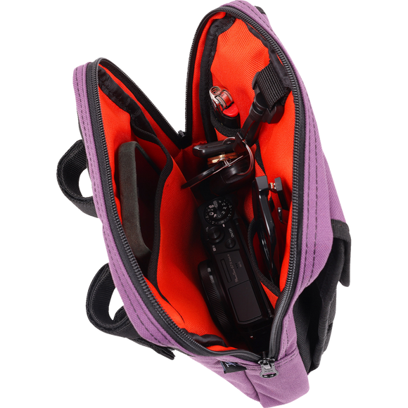 Thrashin Supply Co. Slim Handlebar Bag in black ballistic nylon mounted between fairing and gas tank on Harley-Davidson
