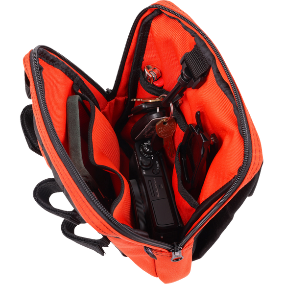 Thrashin Supply Co. Slim Handlebar Bag in black ballistic nylon mounted between fairing and gas tank on Harley-Davidson