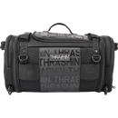 Thrashin Supply Co. Passenger Bag in black ballistic nylon with expandable dual-zipper design and hi-viz orange interior