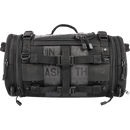 Thrashin Supply Co. Passenger Bag in black ballistic nylon with expandable dual-zipper design and hi-viz orange interior