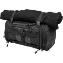 Thrashin Supply Co. Passenger Bag in black ballistic nylon with expandable dual-zipper design and hi-viz orange interior