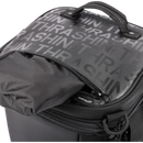 Thrashin Supply Co. Passenger Bag in black ballistic nylon with expandable dual-zipper design and hi-viz orange interior