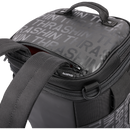 Thrashin Supply Co. Passenger Bag in black ballistic nylon with expandable dual-zipper design and hi-viz orange interior