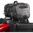 Thrashin Supply Co. Passenger Bag in black ballistic nylon with expandable dual-zipper design and hi-viz orange interior