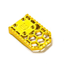 Gold CNC anodized aluminum motorcycle footpeg extension plate with honeycomb cutouts