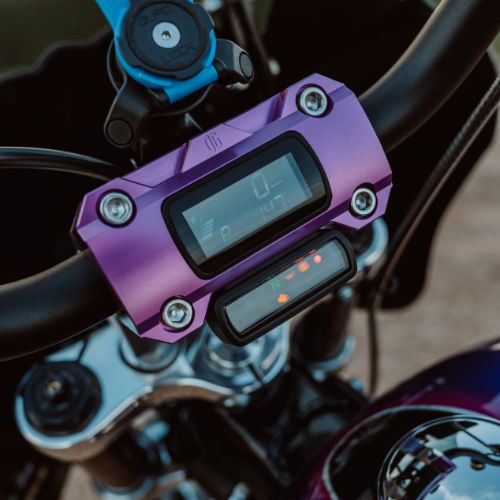 6.5-inch pull-back motorcycle handlebar risers
Purple anodized motorcycle handlebar top clamp with digital LCD speedometer