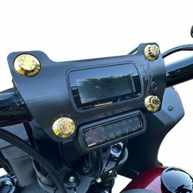 Black Thrashin Digital gauge riser on Harley-Davidson fitted with four gold-plated ARP stainless-steel Bamco bolts
