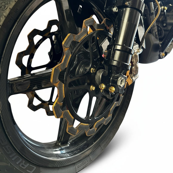 Close-up of Harley-Davidson front brake rotor and wheel fitted with Bamco ARP stainless steel gold bolts