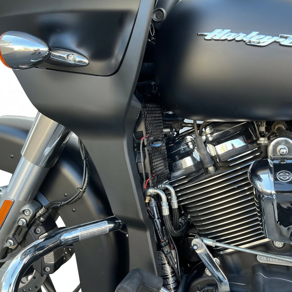 Harley-Davidson M8 Touring close-up showing side-mount oil cooler, braided AN6 lines and ARP stainless steel bolts (Bamco)