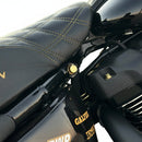 Gold ARP upper shock bolt with 7075 billet washer on black Harley M8 Softail seat/frame, Bamco