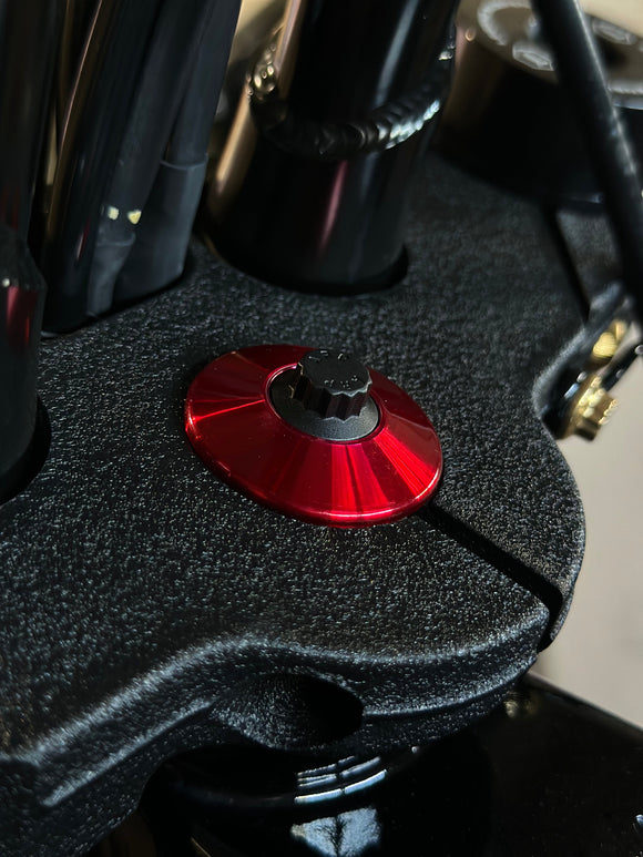 Close-up of Bamco ARP stainless steel bolt with red anodized washer installed on Harley‑Davidson triple tree