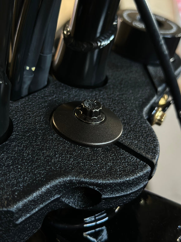 ARP stainless steel flanged bolt by Bamco installed in Harley‑Davidson black textured triple‑tree clamp