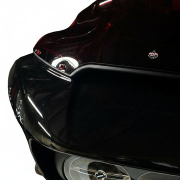 Close-up of Bamco ARP stainless steel bolt with colored CNC washer on black Harley-Davidson Road Glide windshield