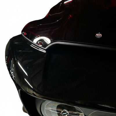 Close-up of Bamco ARP stainless steel bolt with colored CNC washer on black Harley-Davidson Road Glide windshield