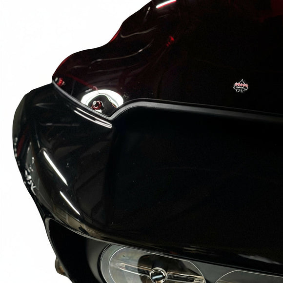 Close-up of Bamco ARP stainless steel bolt with colored CNC washer on black Harley-Davidson Road Glide windshield