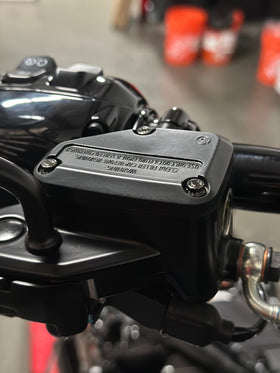 Close-up of BAMCO ARP stainless bolts installed on a Harley-Davidson Harley, Front Brake Reservoir ARP Kit