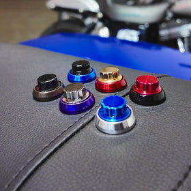 Close-up of the BAMCO 12 Point Billet Seat Bolt installed on a Harley-Davidson Harley